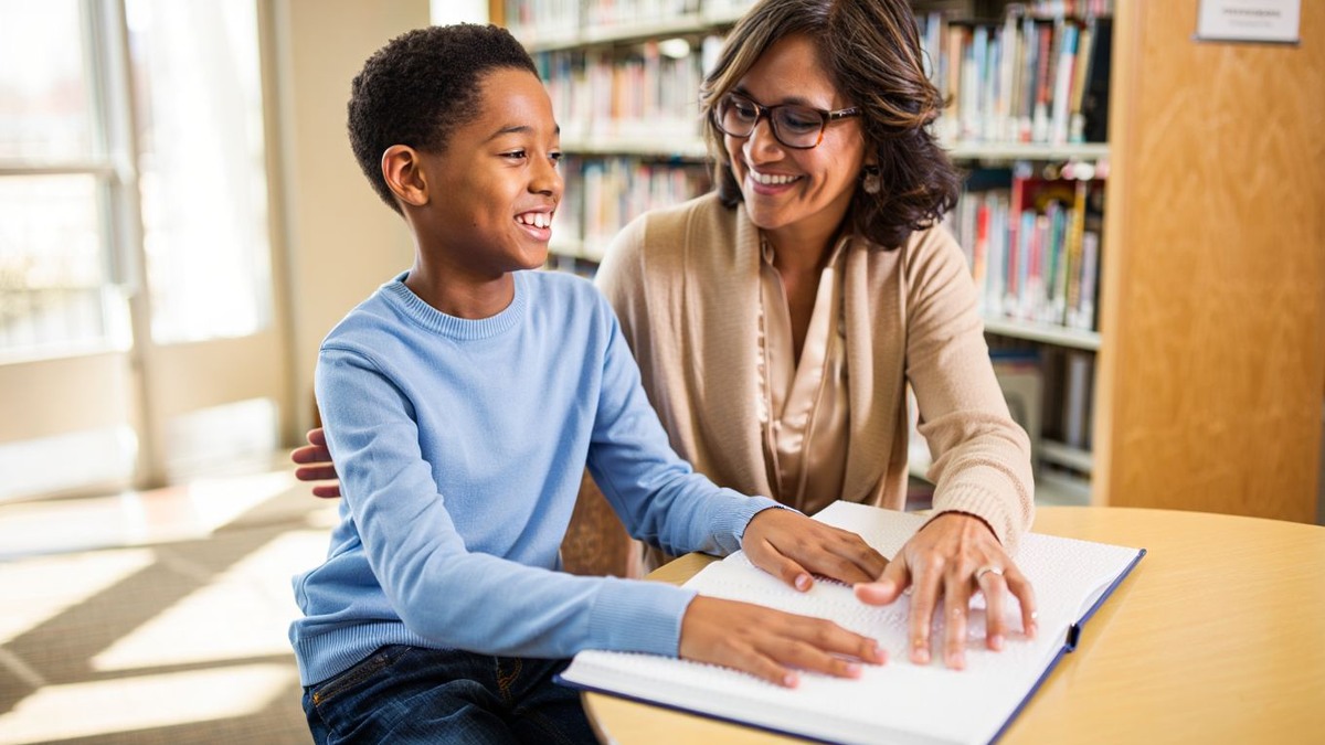 Editorial image for: A Blind Boy Found His Best Friend in His Local Librarian — Their Story Is Beautiful